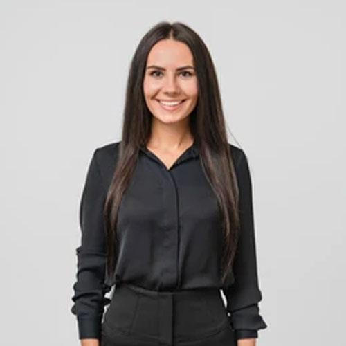 Marlene Smith, a seasoned senior service advisor at The Post Hole Company, stands before a grey backdrop dressed in smart black casual attire. Her professional presence exudes expertise and reliability in providing exceptional service.